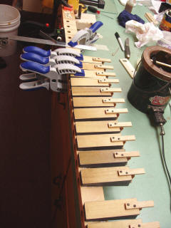Recovered pneumatics being glued to a board
