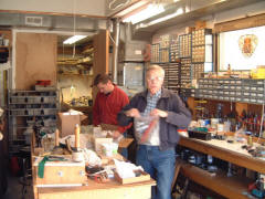 Bob Grunow (left) and Art Reblitz packing small parts for the move back to Montana.
