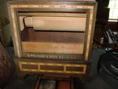 Interior of incomplete Molinari barrel organ; Molinari shop, N.C.